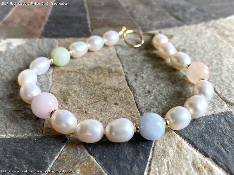 High Lustre White Oval Freshwater Pearl With Beryl Bracelet
